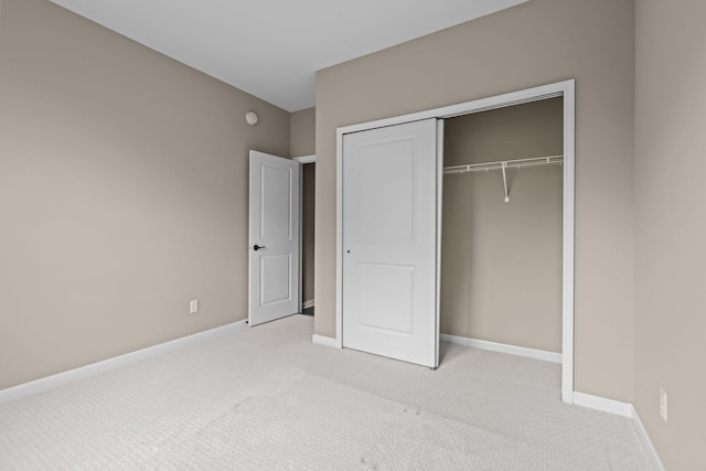 5390 Everest Ln N, Plymouth, MN 55446 - unfurnished bedroom featuring light colored carpet and a closet