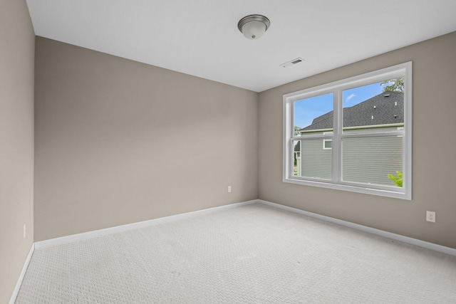 5390 Everest Ln N, Plymouth, MN 55446 - spare room with baseboards and light colored carpet