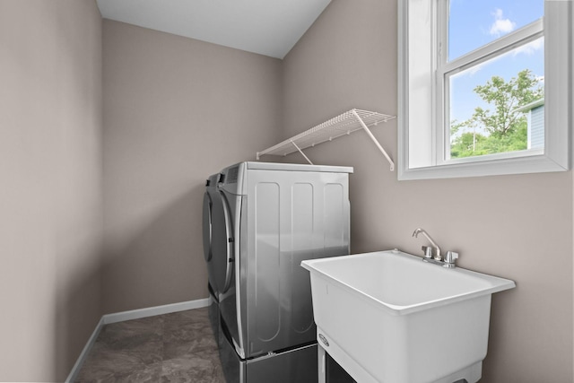 5390 Everest Ln N, Plymouth, MN 55446 - laundry room with washer / dryer and baseboards