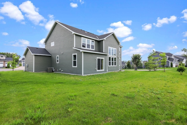 5390 Everest Ln N, Plymouth, MN 55446 - rear view of property with a yard