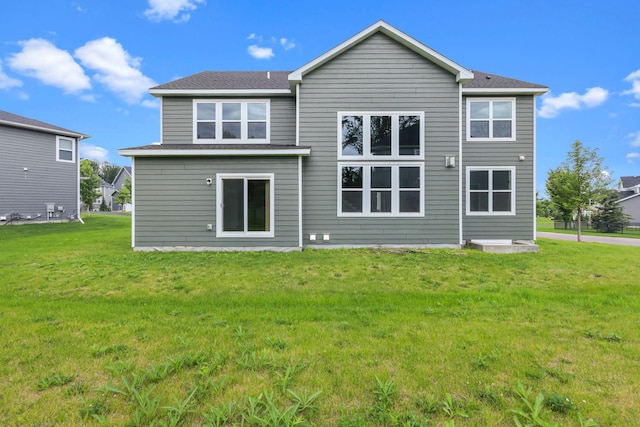 5390 Everest Ln N, Plymouth, MN 55446 - back of house featuring a lawn and a shingled roof