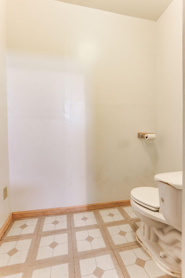 2707 Girard Ave N, Minneapolis, MN 55411 - bathroom featuring toilet and tile patterned floors