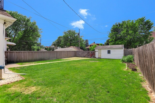 2707 Girard Ave N, Minneapolis, MN 55411 - fenced backyard featuring an outbuilding