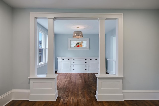 4416 46th Ave S, Minneapolis, MN 55406 - hall with dark wood-style floors and decorative columns
