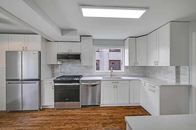 4416 46th Ave S, Minneapolis, MN 55406 - kitchen featuring stainless steel appliances, white cabinetry, and light countertops