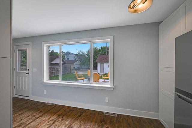 4416 46th Ave S, Minneapolis, MN 55406 - unfurnished dining area featuring dark wood finished floors