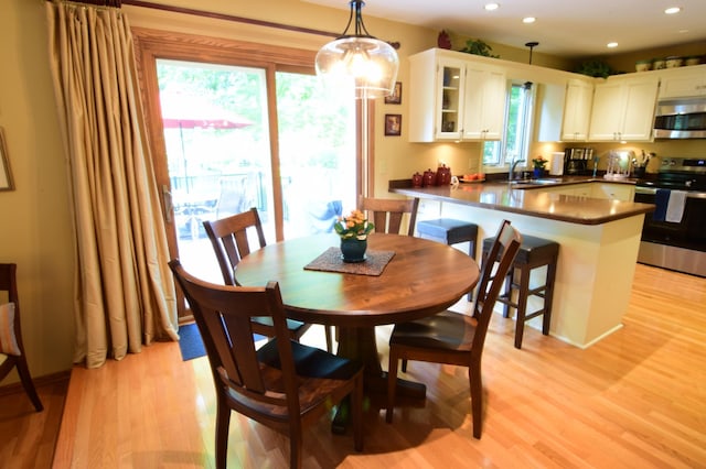 15620 45th Ave N, Plymouth, MN 55446 - dining room with light wood-style floors, recessed lighting, and a chandelier