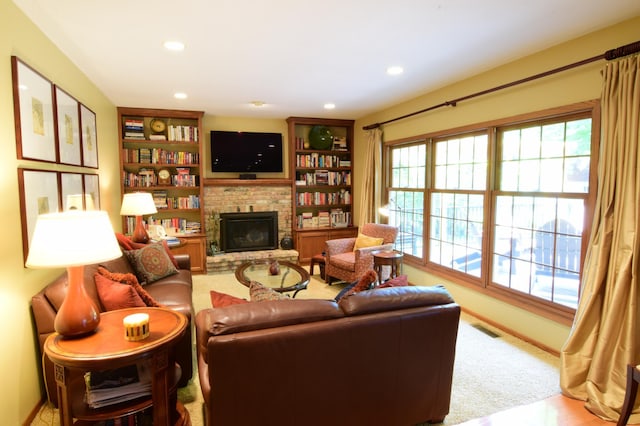 15620 45th Ave N, Plymouth, MN 55446 - living area with a fireplace, carpet flooring, recessed lighting, and built in shelves
