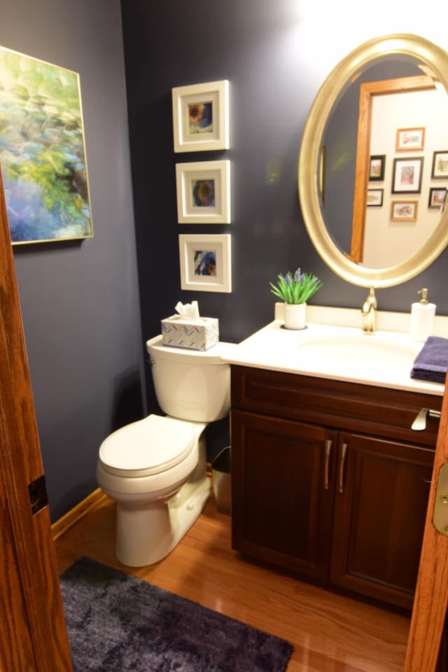 15620 45th Ave N, Plymouth, MN 55446 - half bathroom featuring vanity and wood finished floors