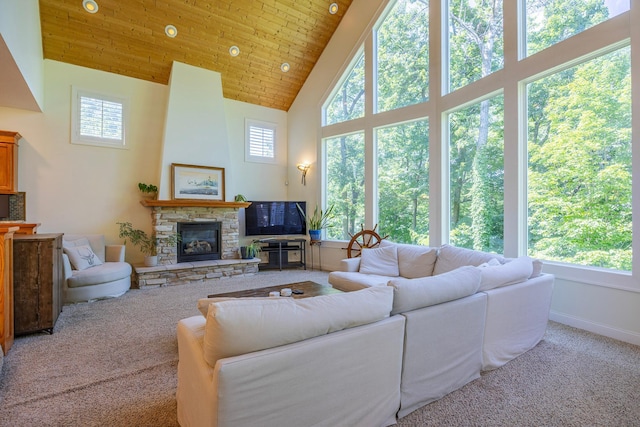 5108 Drummond Rd, Mound, MN 55364 - carpeted living area with high vaulted ceiling, a fireplace, and wood ceiling