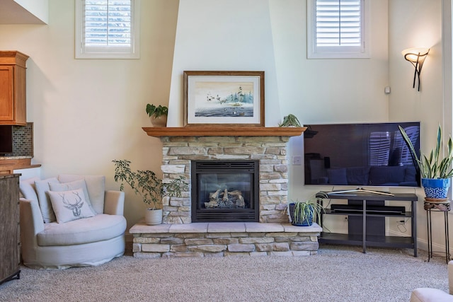 5108 Drummond Rd, Mound, MN 55364 - carpeted living room featuring a stone fireplace