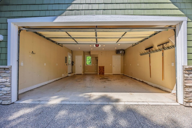 5108 Drummond Rd, Mound, MN 55364 - garage with a garage door opener and driveway