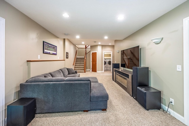 5108 Drummond Rd, Mound, MN 55364 - living area featuring washing machine and dryer, stairway, recessed lighting, and light carpet