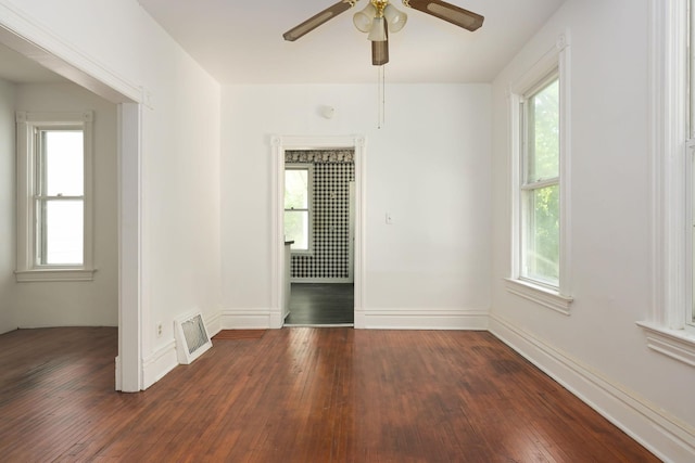 129 Morton St E, Saint Paul, MN 55107 - unfurnished room featuring dark wood-style floors and ceiling fan
