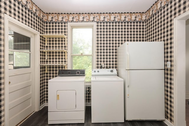 129 Morton St E, Saint Paul, MN 55107 - laundry area with wallpapered walls, dark wood finished floors, and washing machine and clothes dryer