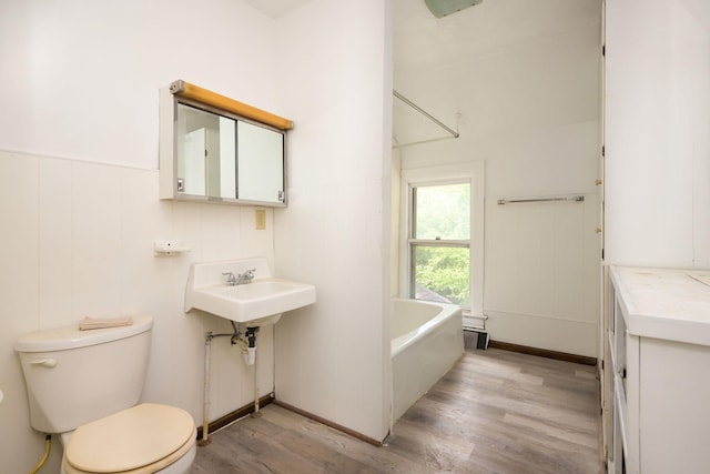 129 Morton St E, Saint Paul, MN 55107 - bathroom with wood finished floors and a tub