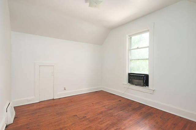 129 Morton St E, Saint Paul, MN 55107 - additional living space with lofted ceiling, wood-type flooring, and cooling unit