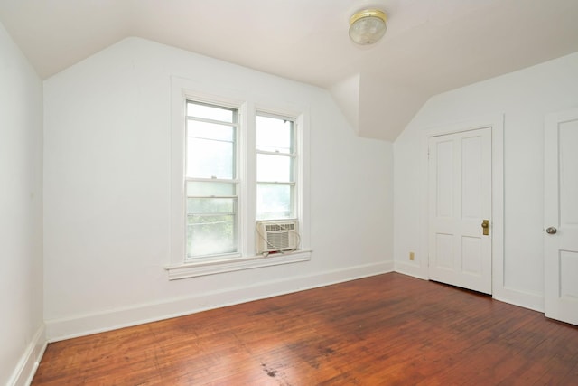129 Morton St E, Saint Paul, MN 55107 - bonus room with lofted ceiling, dark wood finished floors, and cooling unit