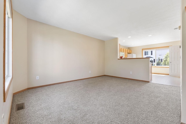 4964 Emmit Dr N Unit 3, Hugo, MN 55038 - unfurnished living room featuring light colored carpet and recessed lighting