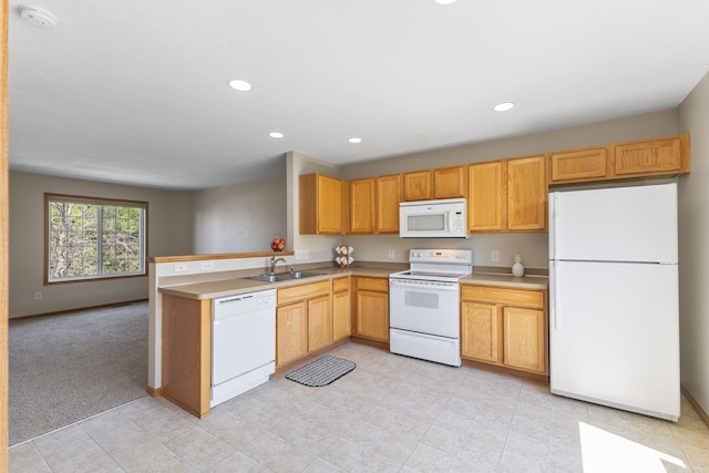 4964 Emmit Dr N Unit 3, Hugo, MN 55038 - kitchen with white appliances, light countertops, recessed lighting, a peninsula, and light tile patterned flooring