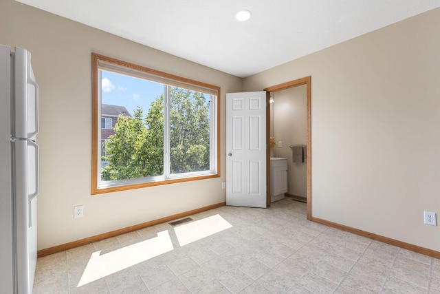 4964 Emmit Dr N Unit 3, Hugo, MN 55038 - unfurnished bedroom with freestanding refrigerator and recessed lighting