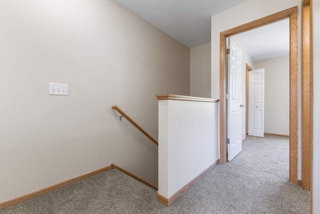 4964 Emmit Dr N Unit 3, Hugo, MN 55038 - hallway with an upstairs landing and carpet flooring
