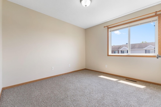 4964 Emmit Dr N Unit 3, Hugo, MN 55038 - empty room with carpet floors and baseboards