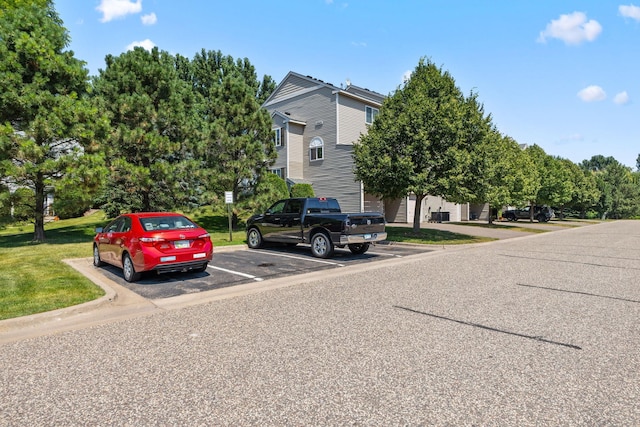 4964 Emmit Dr N Unit 3, Hugo, MN 55038 - exterior space featuring uncovered parking and a yard