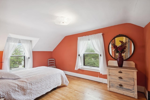 818 7th St S, Stillwater, MN 55082 - bedroom featuring vaulted ceiling and wood finished floors