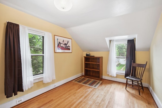 818 7th St S, Stillwater, MN 55082 - bonus room with wood finished floors, vaulted ceiling, and healthy amount of natural light