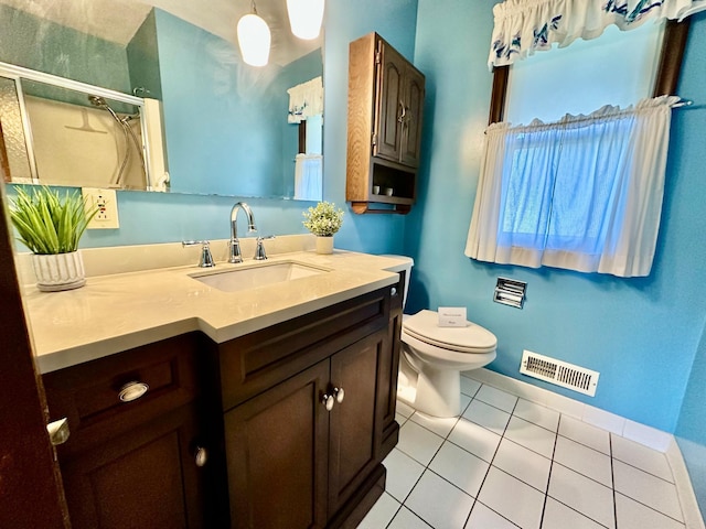 7520 14th Ave S, Richfield, MN 55423 - bathroom featuring tile patterned floors, vanity, and a shower with shower curtain