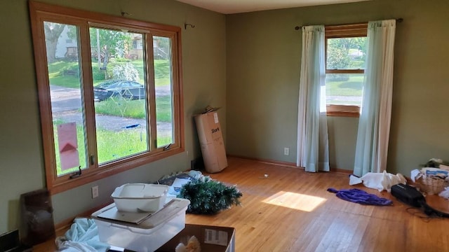 48 Buffalo St, Duluth, MN 55811 - empty room featuring wood finished floors and baseboards