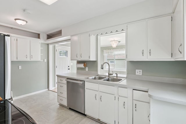 3137 Hampshire Ave S, Saint Louis Park, MN 55426 - kitchen featuring dishwasher, light countertops, white cabinetry, and plenty of natural light