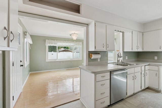 3137 Hampshire Ave S, Saint Louis Park, MN 55426 - kitchen with dishwasher, light countertops, and white cabinetry
