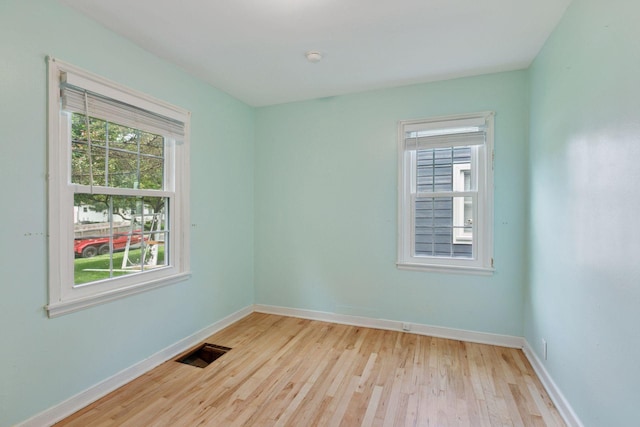 3137 Hampshire Ave S, Saint Louis Park, MN 55426 - empty room featuring wood finished floors and baseboards