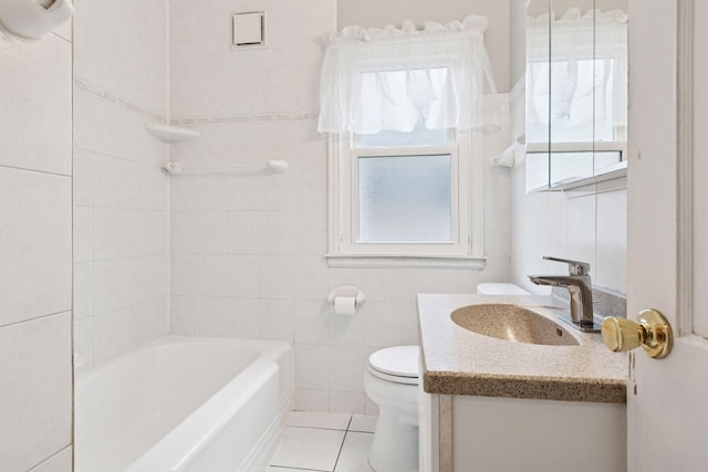 3137 Hampshire Ave S, Saint Louis Park, MN 55426 - bathroom with vanity, tile walls, tile patterned flooring, and tub / shower combination