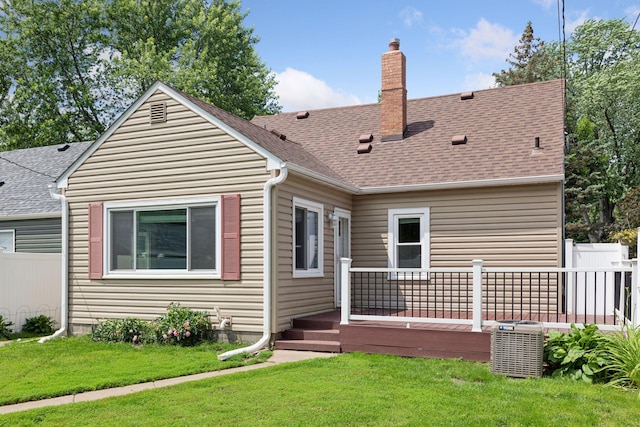 3137 Hampshire Ave S, Saint Louis Park, MN 55426 - rear view of property featuring a wooden deck, a chimney, and a shingled roof