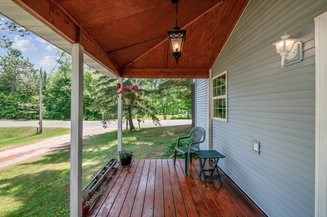 11711 County Rd, B, Lake Nebagamon, WI 54849 - porch featuring a yard