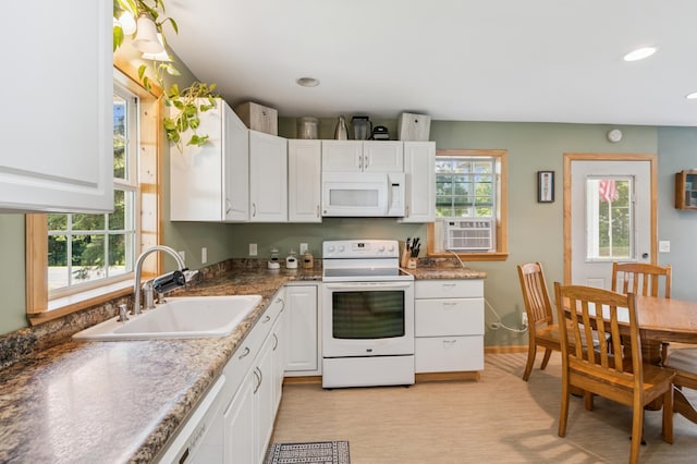 11711 County Rd, B, Lake Nebagamon, WI 54849 - kitchen featuring white appliances, white cabinets, and recessed lighting