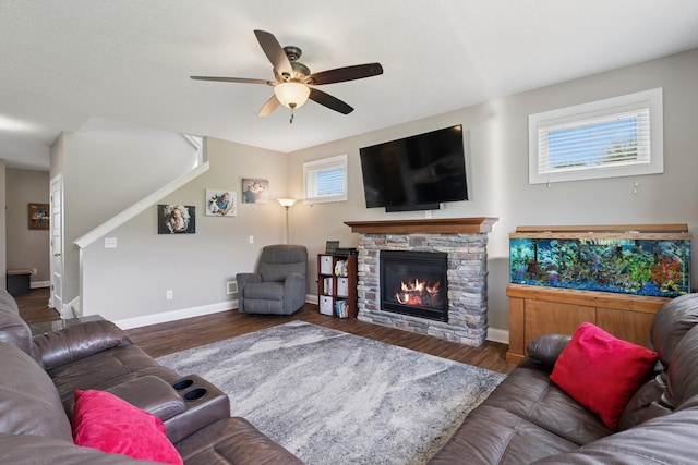 24000 Helium Ct, Forest Lake, MN 55025 - living room featuring ceiling fan, a fireplace, and wood finished floors
