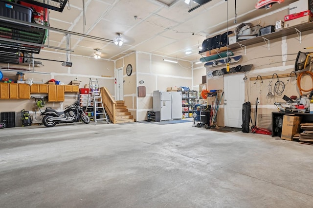 24000 Helium Ct, Forest Lake, MN 55025 - garage with a workshop area and a garage door opener