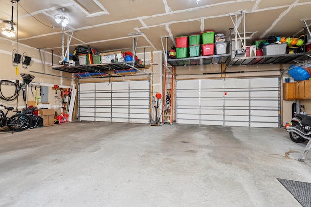 24000 Helium Ct, Forest Lake, MN 55025 - garage with electric panel and a garage door opener