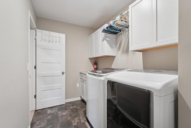 24000 Helium Ct, Forest Lake, MN 55025 - washroom featuring cabinet space, washing machine and dryer, and stone finish flooring