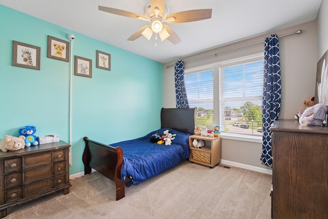 24000 Helium Ct, Forest Lake, MN 55025 - carpeted bedroom with baseboards and a ceiling fan