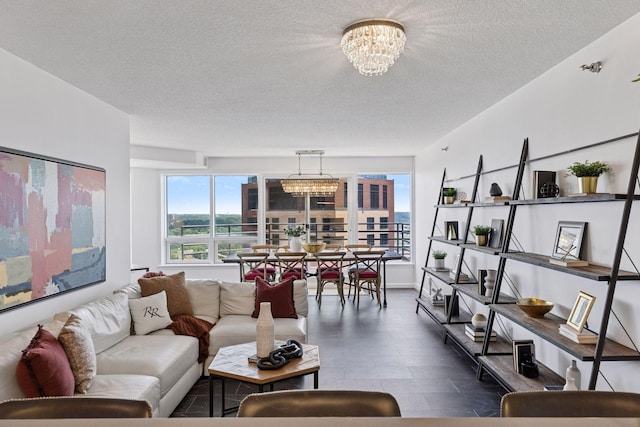 168 6th St E Unit 3004, Saint Paul, MN 55101 - living area featuring a textured ceiling and a chandelier