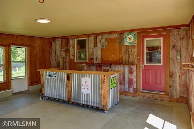 1217 83rd Ave, Lincoln Twp, WI 54001 - kitchen featuring concrete flooring and wood walls
