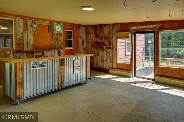 1217 83rd Ave, Lincoln Twp, WI 54001 - kitchen featuring concrete floors and wooden walls