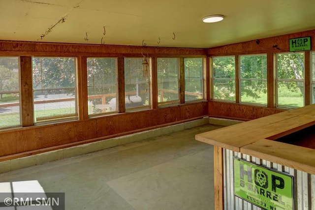 1217 83rd Ave, Lincoln Twp, WI 54001 - unfurnished sunroom featuring plenty of natural light and unfinished concrete floors