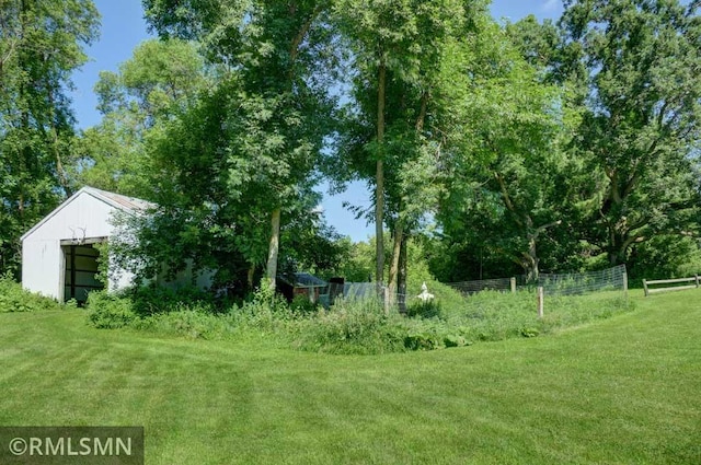 1217 83rd Ave, Lincoln Twp, WI 54001 - view of yard with an outbuilding, a detached garage, and a pole building