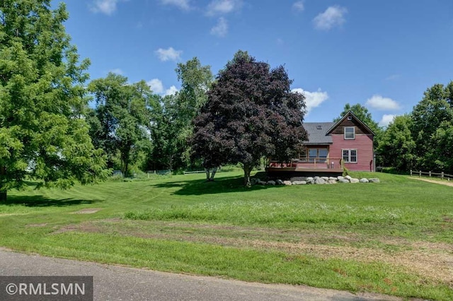 1217 83rd Ave, Lincoln Twp, WI 54001 - view of grassy yard featuring a deck